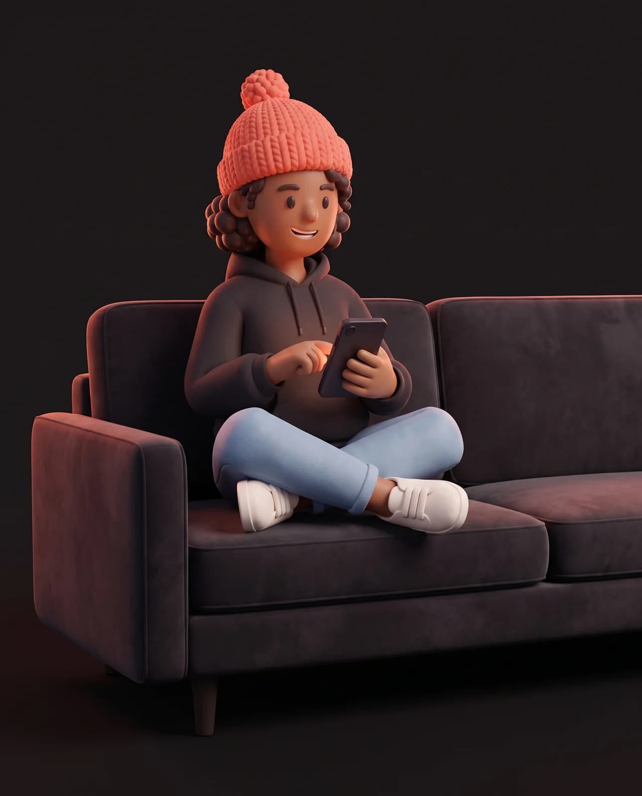 Oopsy, assise en tailleur sur un canapé, sourit en tapant sur son téléphone.